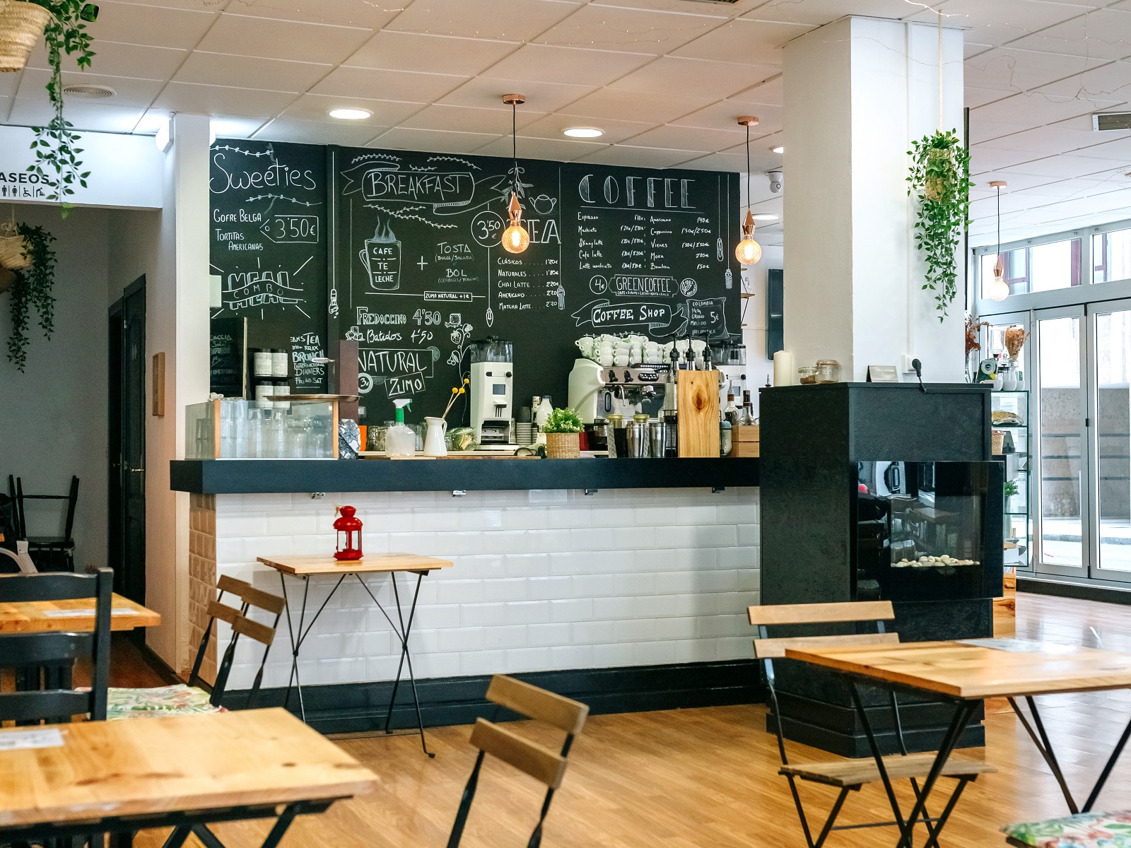 Empty modern cafe interior with chairs and tables